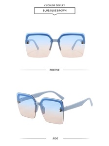 Detail view of rimless blue gradient sunglasses with gold metal H temple decoration