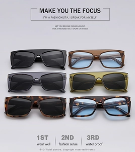 Detailed grid of oversized square sunglasses showing various colors and metallic hinges
