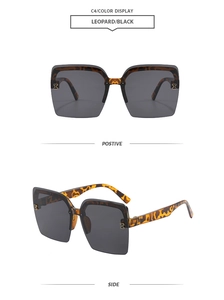 Detail of leopard print rimless sunglasses with gold H-shaped hinge and dark gray lenses