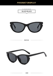 Front and side view of vintage black cat-eye sunglasses with dark grey lenses