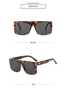 Detail view of Demi and Black oversized square sunglasses with metal hinge accents
