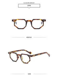Macro detail of geometric tortoise shell glasses with silver arrow accent on side and front