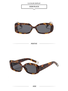 Vue détaillée de lunettes de soleil tendance à motif demi avec monture rectangulaire noire