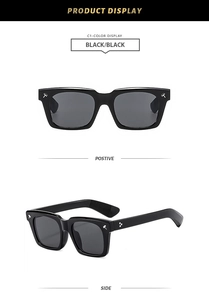 Detail view of black square sunglasses with silver T-shaped metal and 3-dot rivets