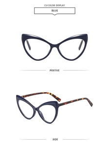 Detail view of stylish deep blue cat-eye frames with classic tortoiseshell temples