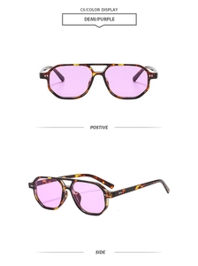 Detail view of tortoiseshell aviator sunglasses with double bridge and purple lenses