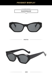 Front and side view of trendy black cat-eye sunglasses with dark gray lenses for women
