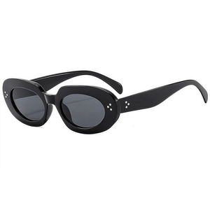 Retro oval black sunglasses with silver rivet accents and dark lenses on white background