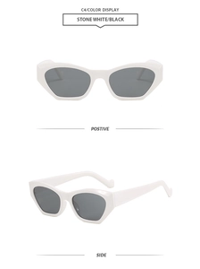 Detail view of stone white geometric cat-eye sunglasses with dark grey lenses