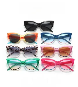 Dettaglio degli occhiali da sole cat eye trendy in sette varianti di colore sfumate