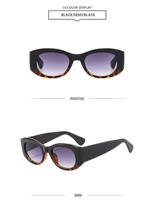 Détail de lunettes de soleil polygonales noir demi avec verres dégradés violets et C6