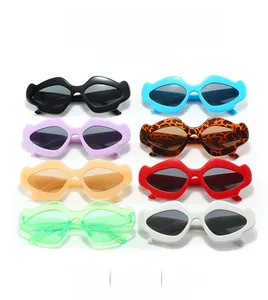 Matrix display of stylish lip-shaped sunglasses in multiple colors and wide frames