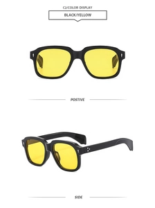 Detail view of black square sunglasses with yellow lenses and silver arrow accents