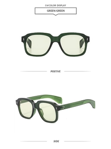 Detail view of square green sunglasses featuring silver diamond accents and metal hinges
