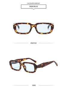 Détails de lunettes de soleil carrées en écaille avec des verres bleu clair tendance