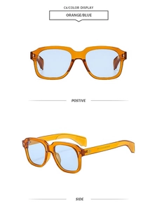 Detail view of square orange frame sunglasses with blue lenses and star metal rivets