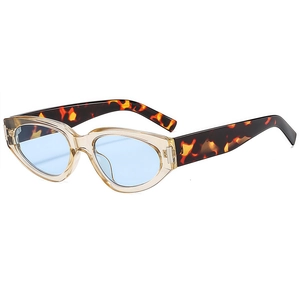 Retro cat-eye sunglasses with champagne frames and light blue lenses for a trendy fashion look