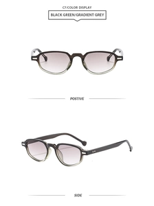 Macro detail of dark green cat eye sunglasses with grey gradient lenses and silver pins