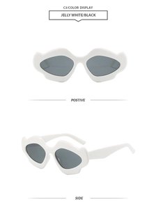 Detail view of jelly white wavy frame sunglasses with dark grey lenses in C3 colorway
