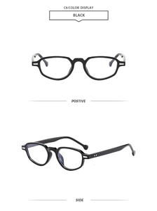 Detail view of black cat-eye sunglasses featuring thick frames and silver metal accents