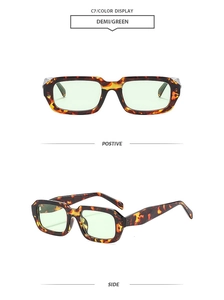 Vue détaillée de lunettes de soleil rectangulaires vintage avec monture demi-teinte