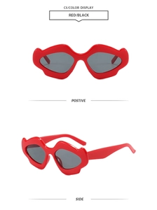 Front and side views of trendy red lip-shaped sunglasses with protective grey lenses