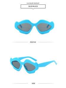 Detail of trendy wavy lip-shaped sunglasses in blue with dark lenses and side view