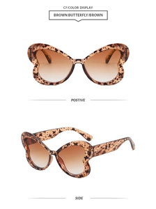 Vues détaillées de face et de profil des lunettes papillon oversize écaillées et marron