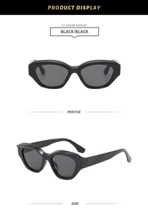 Détail de lunettes de soleil œil de chat noires avec branches texturées et verres UV