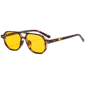 Classic aviator sunglasses with vibrant yellow lenses and tortoise shell frames