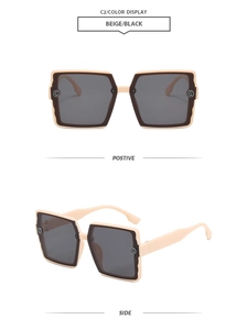 Detail view of beige square oversized sunglasses with G logo hinge and wavy frames