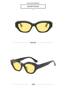 Vue détaillée des lunettes de soleil œil de chat rétro avec monture noire et verres jaunes