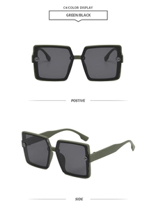 Detail of square oversized green sunglasses with wave-textured frame and G-logo hinges
