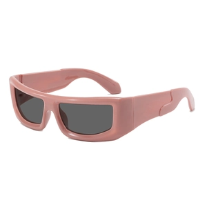 Chic pink wraparound sunglasses with thick frames and dark lenses in Y2K style