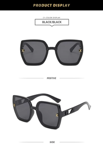 Front and side view of vintage polygon sunglasses with gold metal geometric details