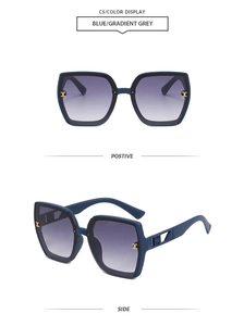 Close-up of blue square sunglasses with gradient grey lenses and golden H metal details