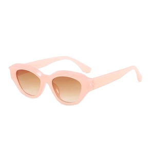 Lunettes de soleil œil de chat rétro avec monture rose translucide et verres dégradés