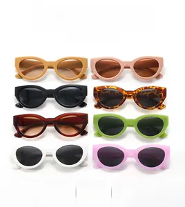 Collection of vintage cat eye sunglasses in eight vibrant colors on a white background