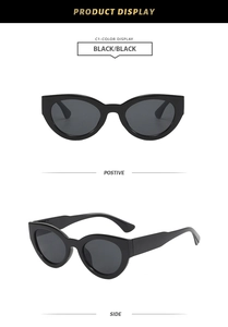 Front and side view of retro cat eye sunglasses with glossy black frames and wide temples