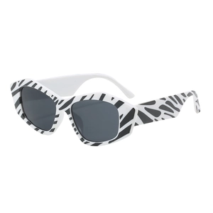 Fashionable oversized irregular cat-eye sunglasses with bold zebra print frames
