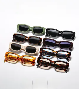 Multiple retro rectangular sunglasses in various colors displayed in an organized row