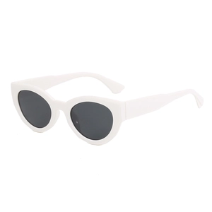 Retro cat-eye sunglasses with white thick plastic frames and dark lenses on white background