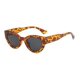 Retro tortoise shell cat eye sunglasses with thick temples and dark lenses for UV protection