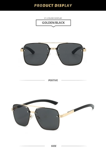 Detail view of golden metal aviator sunglasses with black lenses and double bridge design