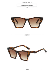 Vue détaillée des lunettes de soleil écaillées oversize avec verres dégradés bruns