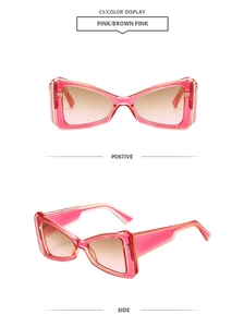 Front and side views of trendy pink geometric butterfly frame sunglasses with gradient lenses