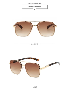 Detail of pilot sunglasses showing golden metal frames and brown gradient lenses