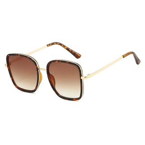 Lunettes de soleil carrées oversize en écaille de tortue avec branches dorées et verres bruns
