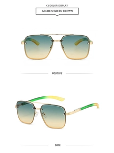 Detail view of retro aviator sunglasses with gold frame and green-brown gradient lenses