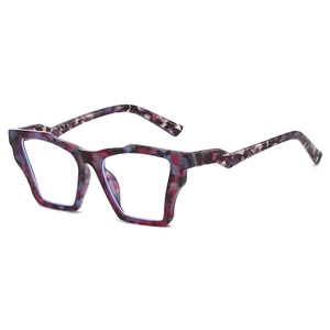 Lunettes de soleil oversize polygonales avec monture marbrée violette et rouge